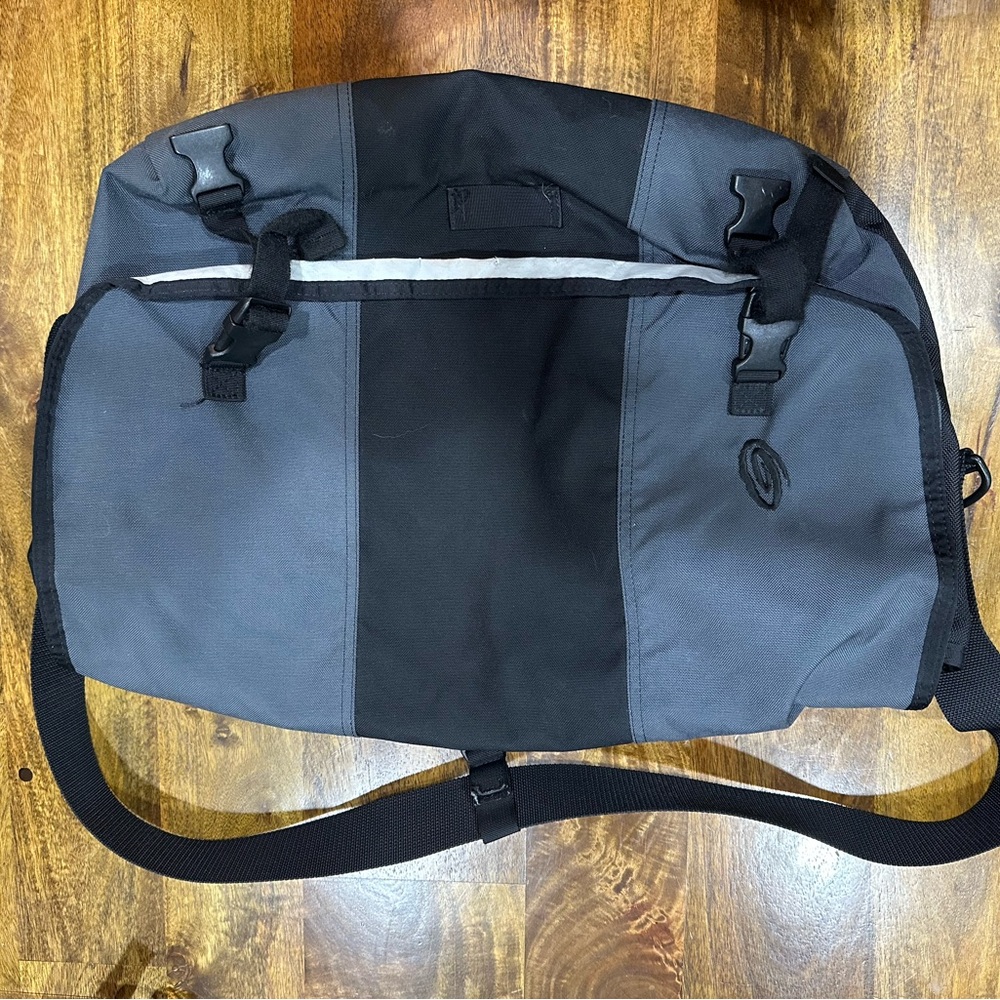 Black and Gray Messenger Bag with Adjustable Shoulder Strap and Durable Material